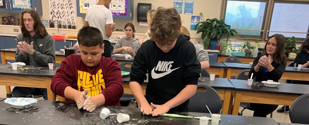 Middle School science students working on a lab